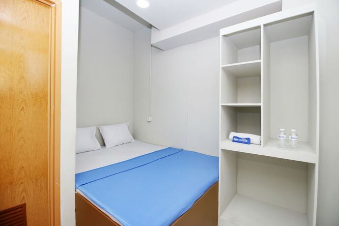 Imagen general del Hotel Kamar Keluarga Bandara VII Syariah. Foto 5