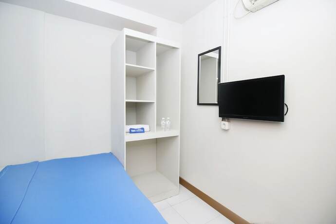 Imagen general del Hotel Kamar Keluarga Bandara VII Syariah. Foto 6