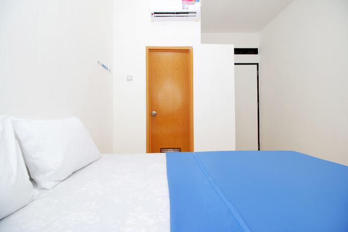 Imagen de la habitación del Hotel Kamar Keluarga Haji Peeng Syariah. Foto 7