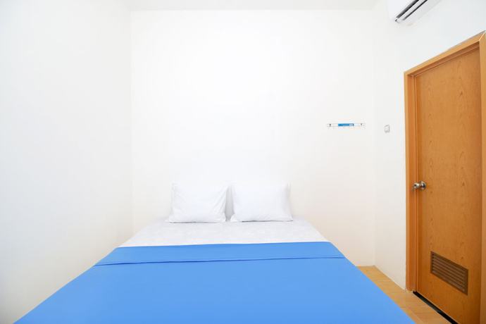 Imagen de la habitación del Hotel Kamar Keluarga Haji Peeng Syariah. Foto 10