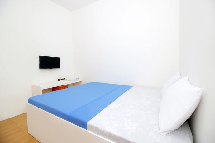 Imagen de la habitación del Hotel Kamar Keluarga Haji Peeng Syariah. Foto 11