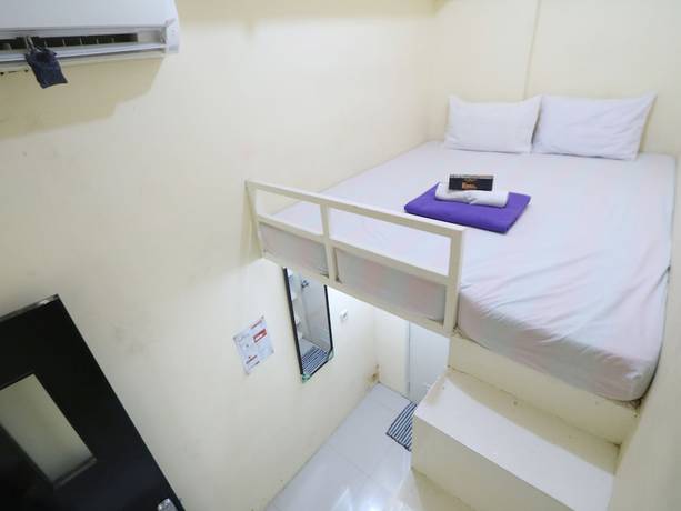 Imagen de la habitación del Hotel Kamar Keluarga Jelambar Syariah. Foto 3