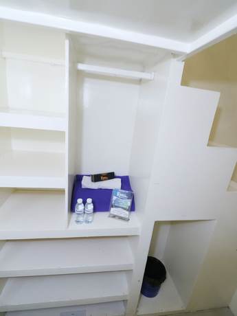 Imagen de la habitación del Hotel Kamar Keluarga Jelambar Syariah. Foto 10