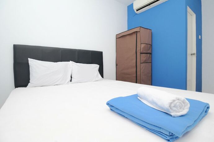 Imagen de la habitación del Hotel Kamar Keluarga Kalideres II Syariah. Foto 11