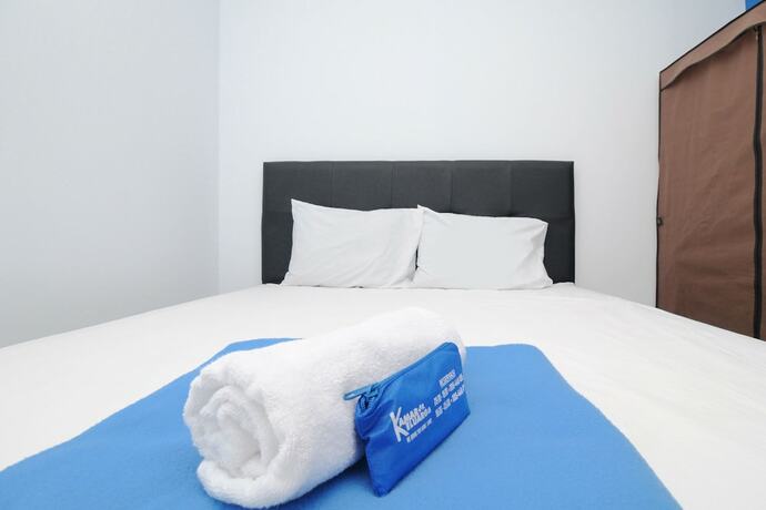 Imagen de la habitación del Hotel Kamar Keluarga Kalideres II Syariah. Foto 12