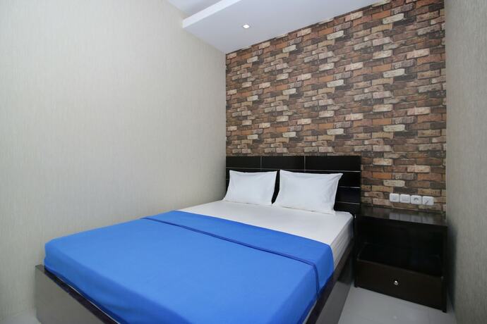 Imagen de la habitación del Hotel Kamar Keluarga Kampung Bali III Syariah. Foto 16