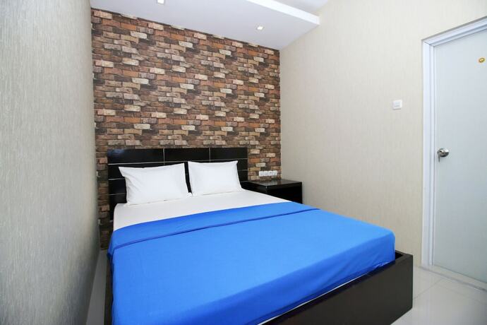 Imagen de la habitación del Hotel Kamar Keluarga Kampung Bali III Syariah. Foto 19