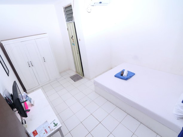 Imagen de la habitación del Hotel Kamar Keluarga Kartini. Foto 5