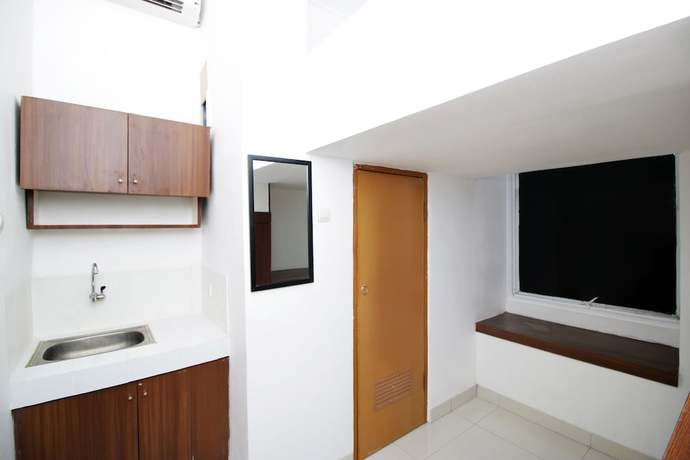 Imagen de la habitación del Hotel Kamar Keluarga Kemanggisan Syariah. Foto 4