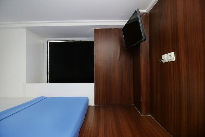 Imagen de la habitación del Hotel Kamar Keluarga Kemanggisan Syariah. Foto 5