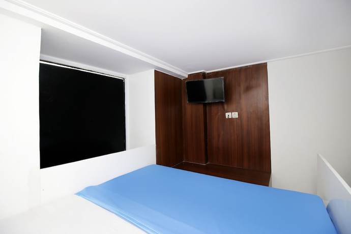 Imagen de la habitación del Hotel Kamar Keluarga Kemanggisan Syariah. Foto 6