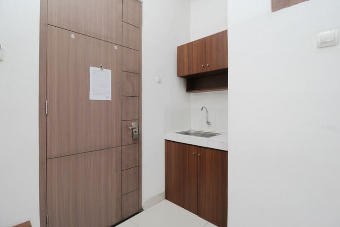 Imagen de la habitación del Hotel Kamar Keluarga Kemanggisan Syariah. Foto 7