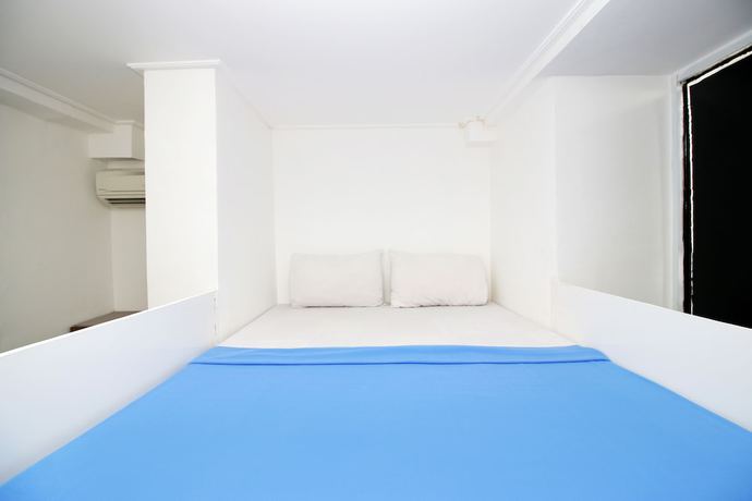 Imagen de la habitación del Hotel Kamar Keluarga Kemanggisan Syariah. Foto 11