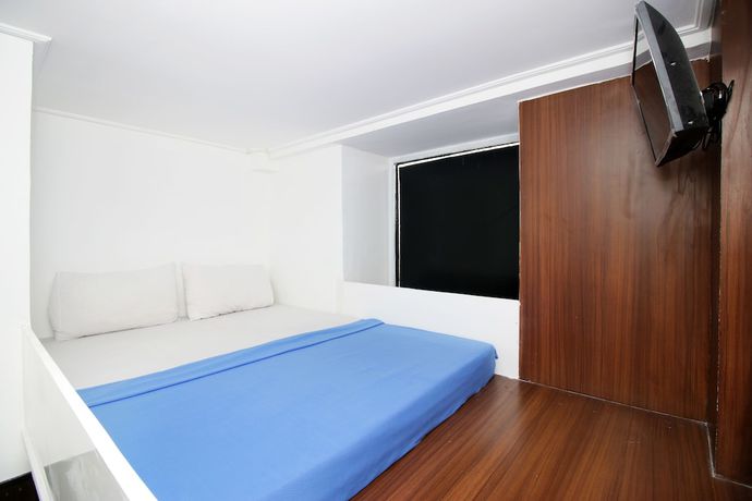 Imagen de la habitación del Hotel Kamar Keluarga Kemanggisan Syariah. Foto 13
