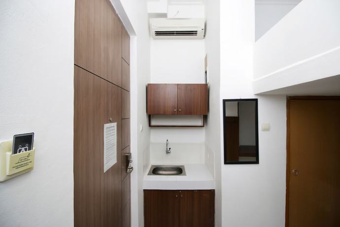 Imagen de la habitación del Hotel Kamar Keluarga Kemanggisan Syariah. Foto 14