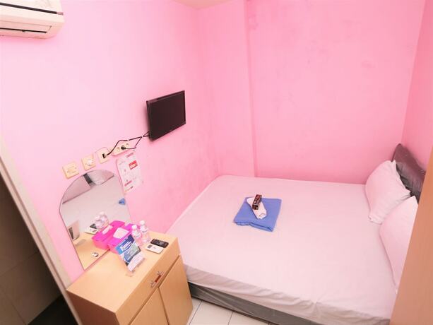 Imagen de la habitación del Hotel Kamar Keluarga Mangga Besar. Foto 17