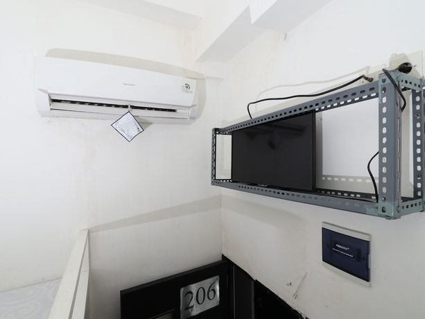 Imagen de la habitación del Hotel Kamar Keluarga Semanan Syariah. Foto 10