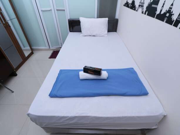 Imagen de la habitación del Hotel Kamar Keluarga Tanah Abang. Foto 20