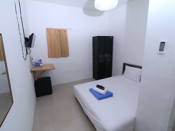 Imagen de la habitación del Hotel Kamar Keluarga Ungaran. Foto 5