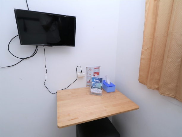 Imagen de la habitación del Hotel Kamar Keluarga Ungaran. Foto 11