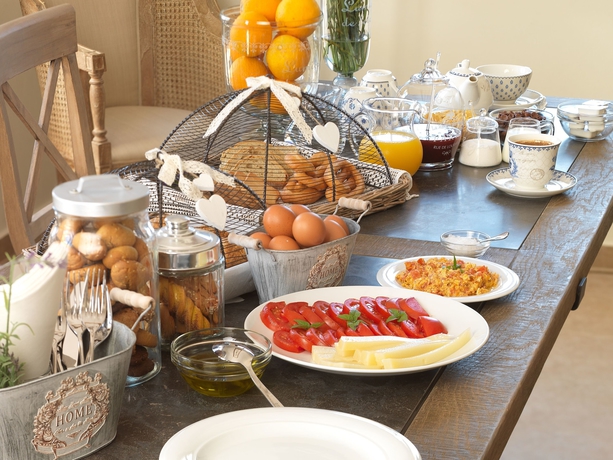 Imagen del bar/restaurante del Hotel Kamares Villas. Foto 4