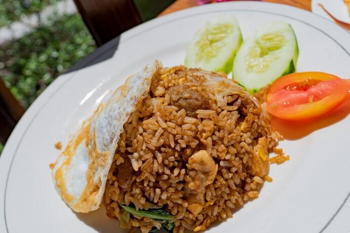 Imagen del bar/restaurante del Hotel Kamasan Cottage. Foto 20