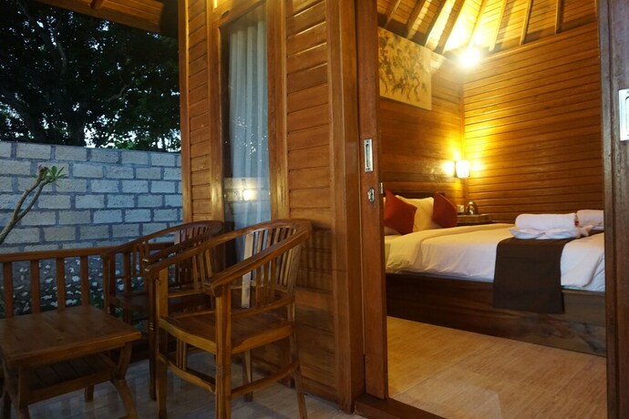 Imagen de la habitación del Hotel Kamasan Cottage. Foto 22