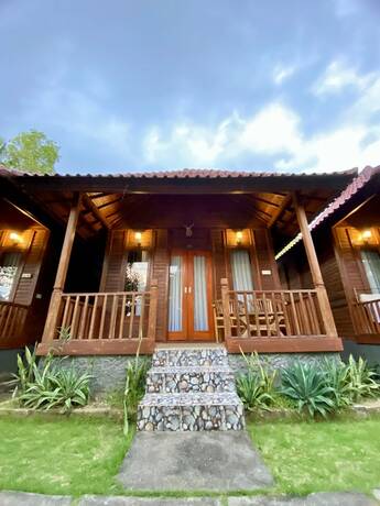 Imagen de la habitación del Hotel Kamasan Cottage. Foto 26