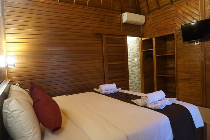 Imagen de la habitación del Hotel Kamasan Cottage. Foto 27