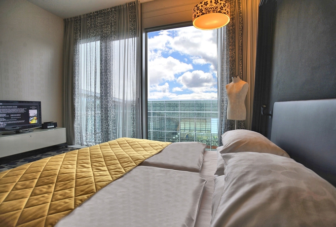 Imagen de la habitación del Hotel Kameha Grand Bonn. Foto 8