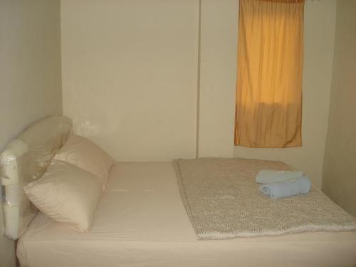 Imagen de la habitación del Hotel Kameleoon Travellers Lodge. Foto 4