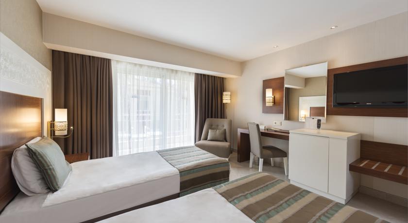 Imagen de la habitación del Hotel Kamelya Aishen Club. Foto 5