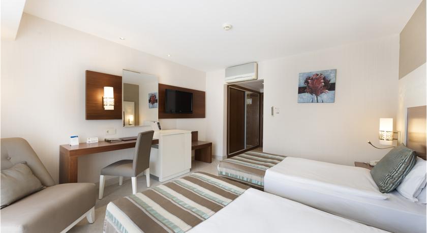 Imagen de la habitación del Hotel Kamelya Aishen Club. Foto 6