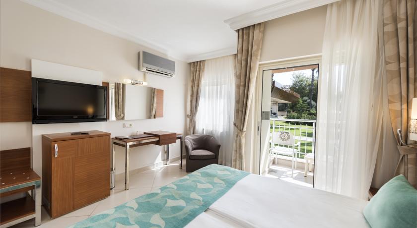 Imagen de la habitación del Hotel Kamelya Aishen Club. Foto 7