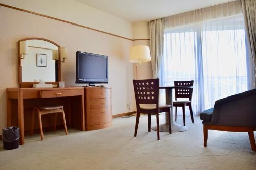 Imagen de la habitación del Hotel Kamenoi Atami. Foto 10