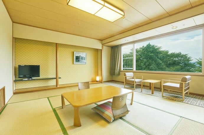Imagen de la habitación del Hotel Kamenoi Fukui. Foto 18
