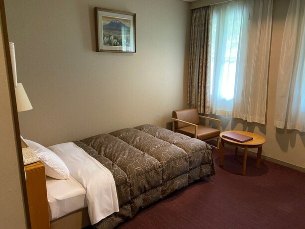 Imagen de la habitación del Hotel Kamenoi Fukui. Foto 19
