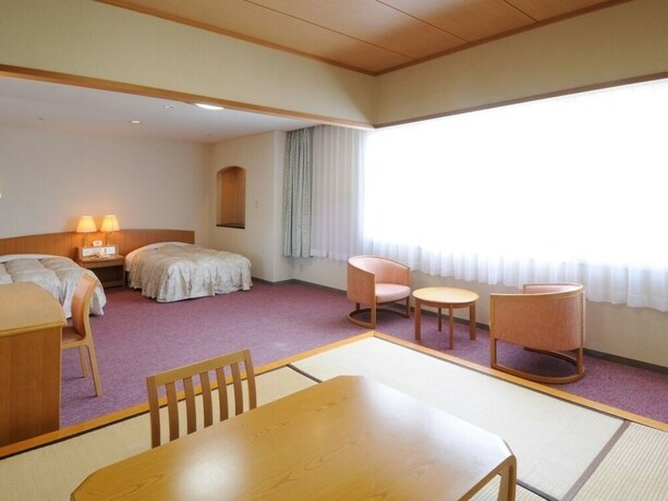 Imagen de la habitación del Hotel Kamenoi Fukui. Foto 21