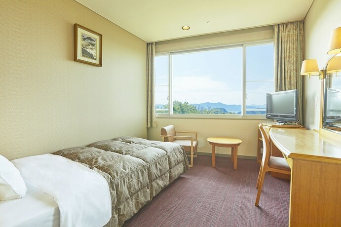 Imagen de la habitación del Hotel Kamenoi Fukui. Foto 22