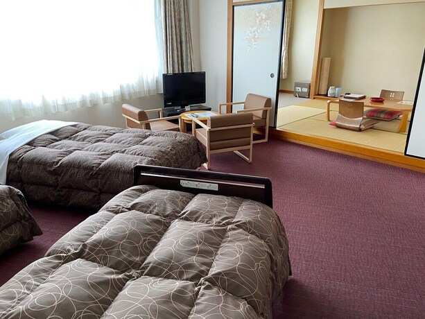 Imagen de la habitación del Hotel Kamenoi Fukui. Foto 25