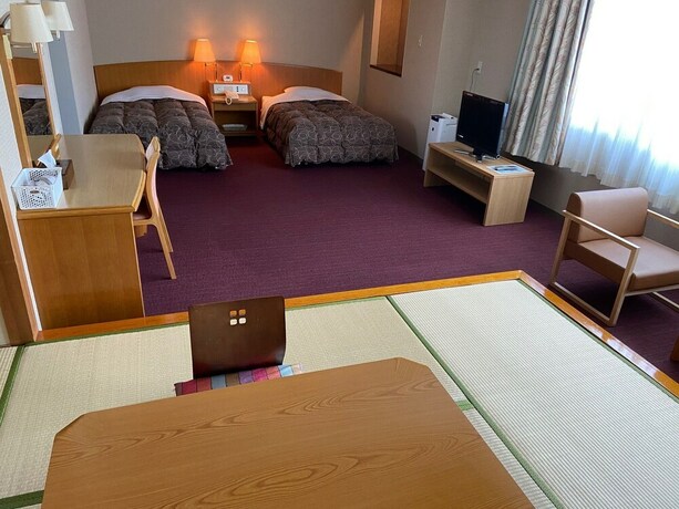Imagen de la habitación del Hotel Kamenoi Fukui. Foto 31