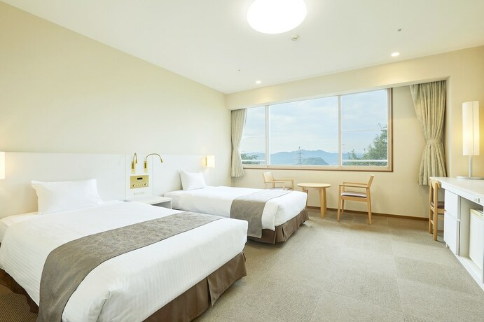 Imagen de la habitación del Hotel Kamenoi Fukui. Foto 32