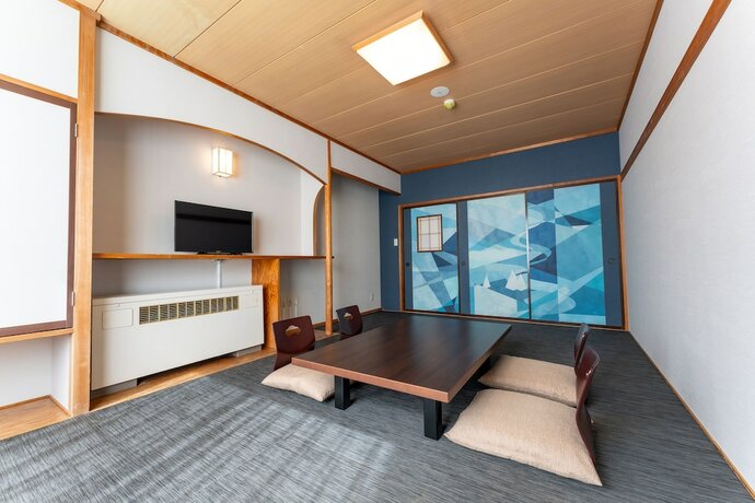 Imagen de la habitación del Hotel Kamenoi Kusatsu Yubatake. Foto 11