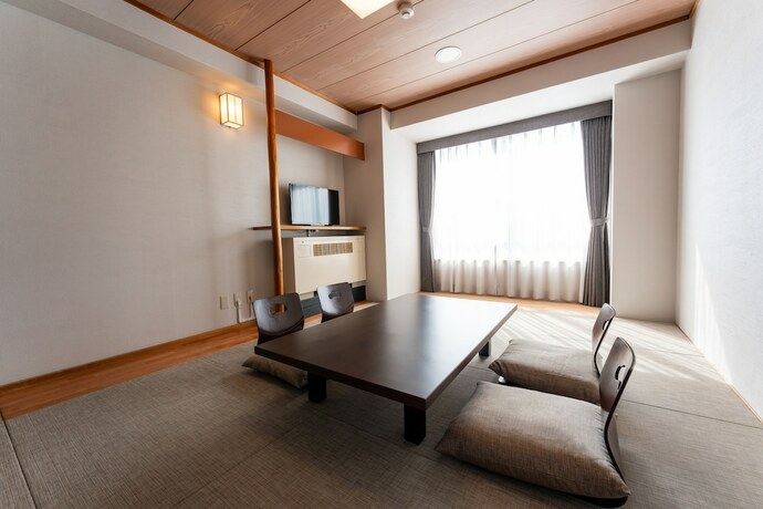 Imagen de la habitación del Hotel Kamenoi Kusatsu Yubatake. Foto 12
