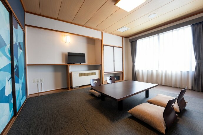 Imagen de la habitación del Hotel Kamenoi Kusatsu Yubatake. Foto 13