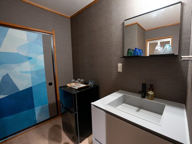 Imagen de la habitación del Hotel Kamenoi Kusatsu Yubatake. Foto 14