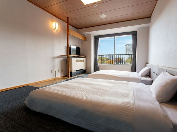 Imagen de la habitación del Hotel Kamenoi Kusatsu Yubatake. Foto 17