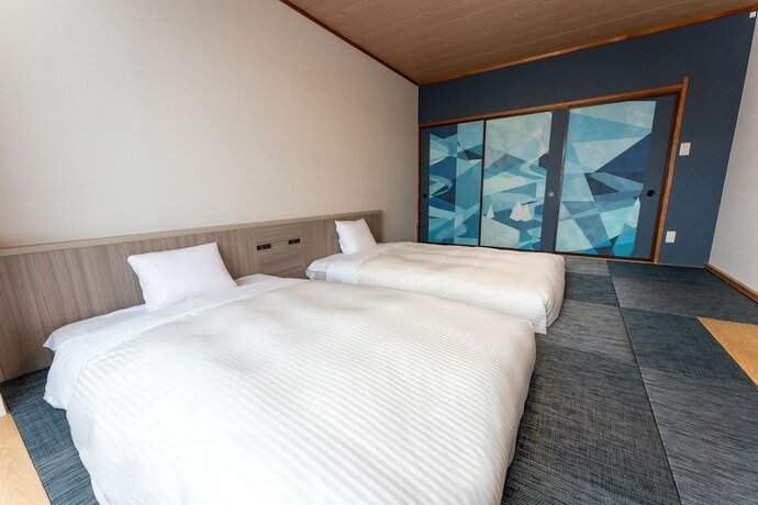 Imagen de la habitación del Hotel Kamenoi Kusatsu Yubatake. Foto 18