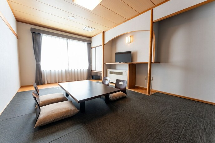 Imagen de la habitación del Hotel Kamenoi Kusatsu Yubatake. Foto 19