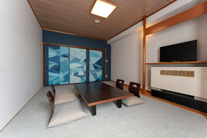 Imagen de la habitación del Hotel Kamenoi Kusatsu Yubatake. Foto 21
